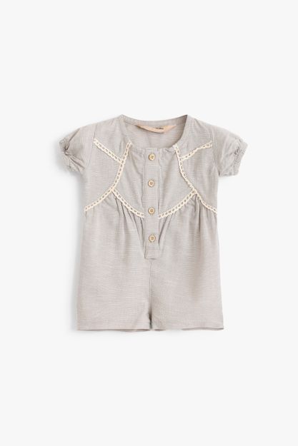 Textured cotton baby girl romper with lace trim bib detail and wooden button front 0-3 mth Front | Locafy